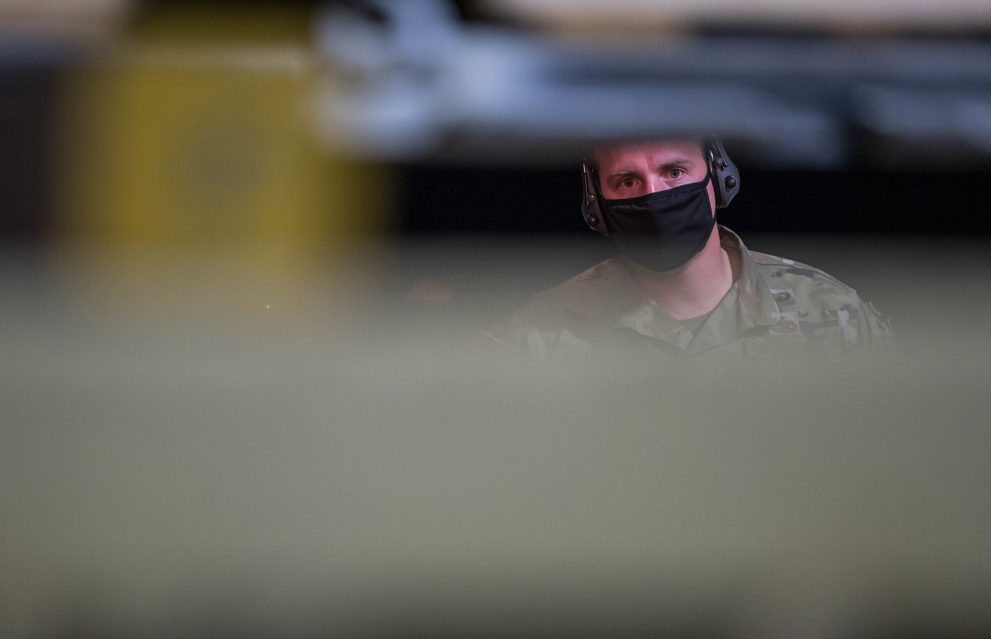 Religious Affairs Airman guides forklift