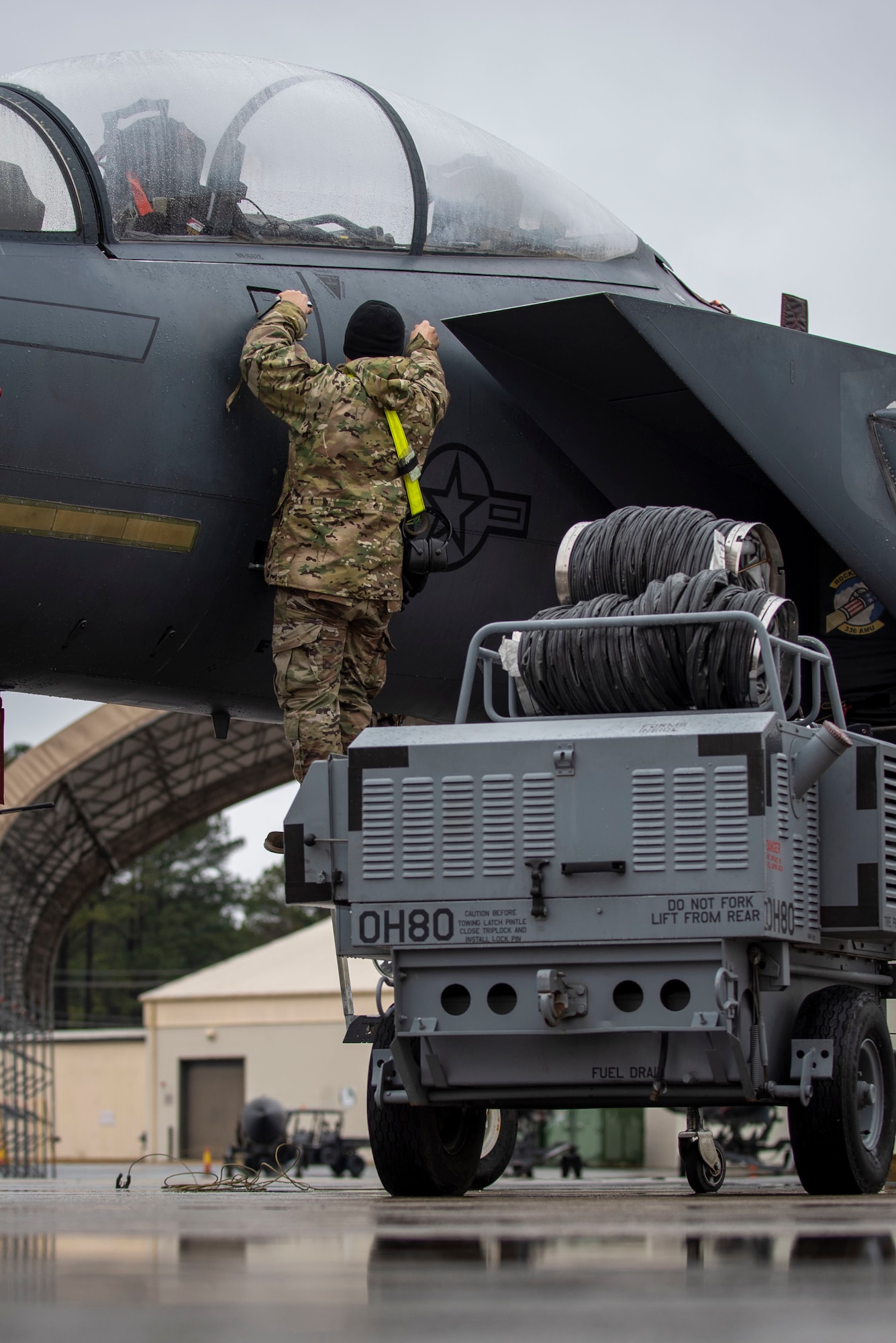 Airman 1st Class Kevin Lazo, 336th Fighter Squadron avionics technician, replaces a line replacement unit on an F-15E Strike Eagle at Seymour Johnson Air Force Base, North Carolina, Feb. 18, 2021.