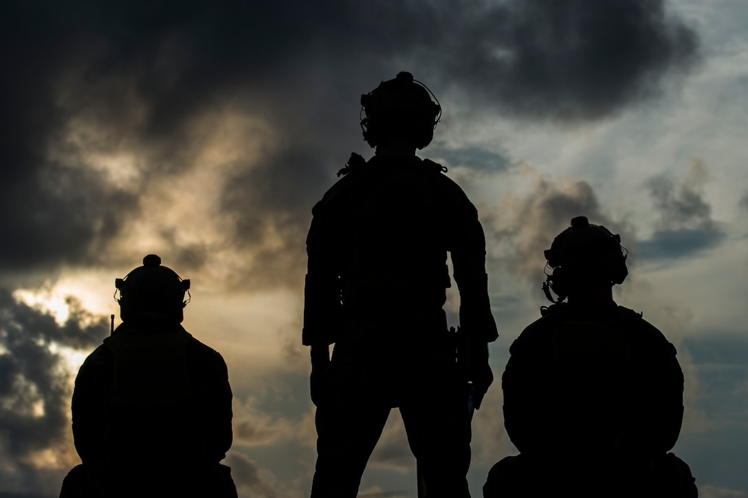 U.S. Marine Corps Raiders with the 3d Marine Raider Battalion take a break during training at Eglin Range, Fla., May 22, 2018. The 1st Special Operations Support Squadron Operations Support Joint Office coordinates two-week training programs for U.S. Army, Navy and Marine special operations forces that provides live-fire ranges and familiarizes them with Air Force Special Operations Command assets to ensure global readiness. (U.S. Air Force photo by Senior Airman Joseph Pick)