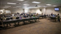Joint Task Force Civil Support, XVIII Airborne Corps, 129th Combat Sustainment Support Battalion, 44th Medical Brigade, 20th Engineer Brigade, and 78th Training Division personnel attend a distributed commander's update brief to sync simulated disaster response operations during a command post training exercise on Fort Bragg, N.C., Feb. 24, 2021.