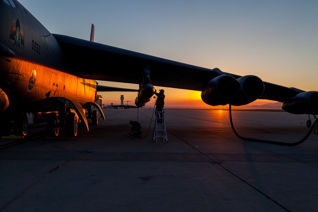 An airman works on an aircraft.