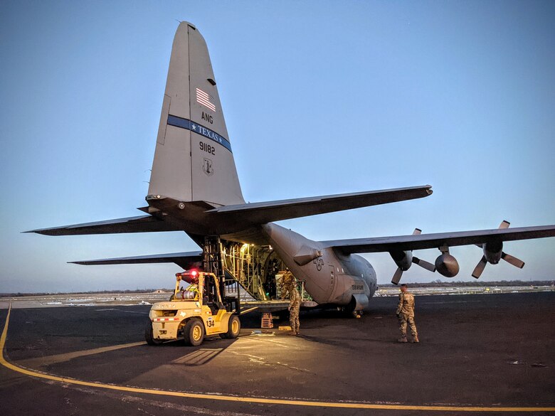 Water pallets loaded on C-130H