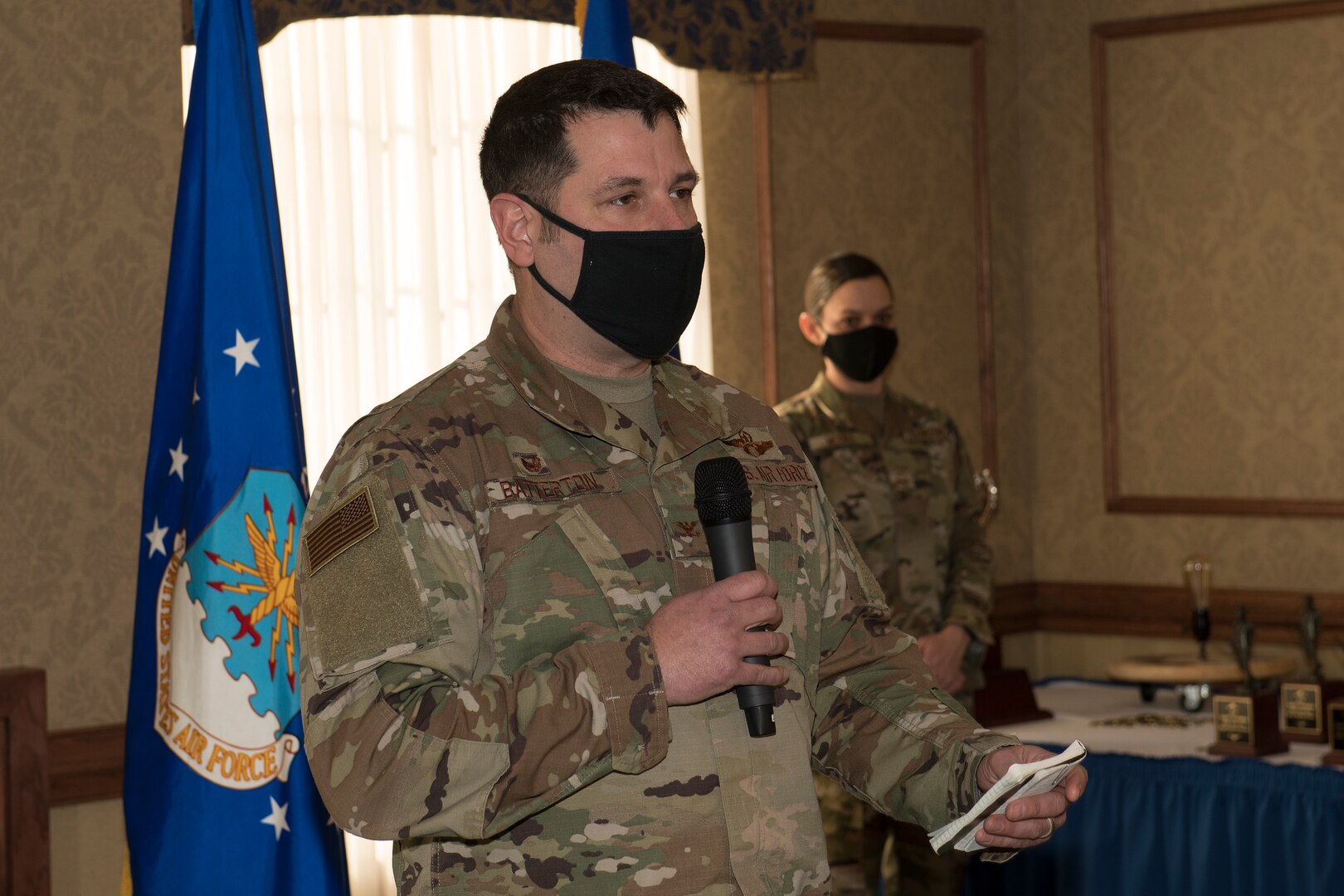 An Air Force commander addresses the crowd during a ceremony