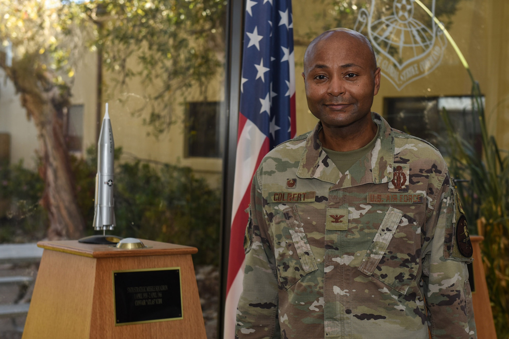 USAF officer poses for a photo at the 576the Flight Test Squadron headquarters at Vandenberg Air Force Base, California.