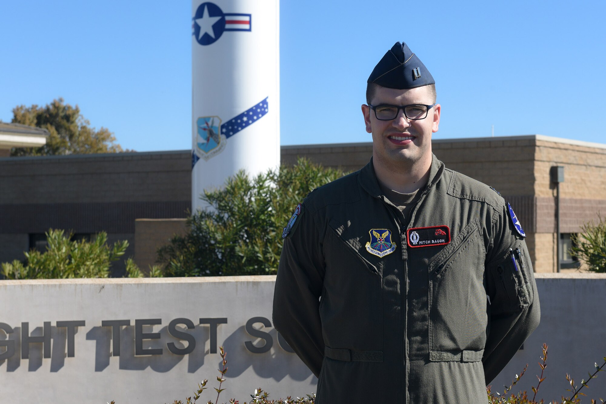 Minuteman III operator poses for a photo at a Minuteman Missile display at Vandenberg Air Force Base, California.