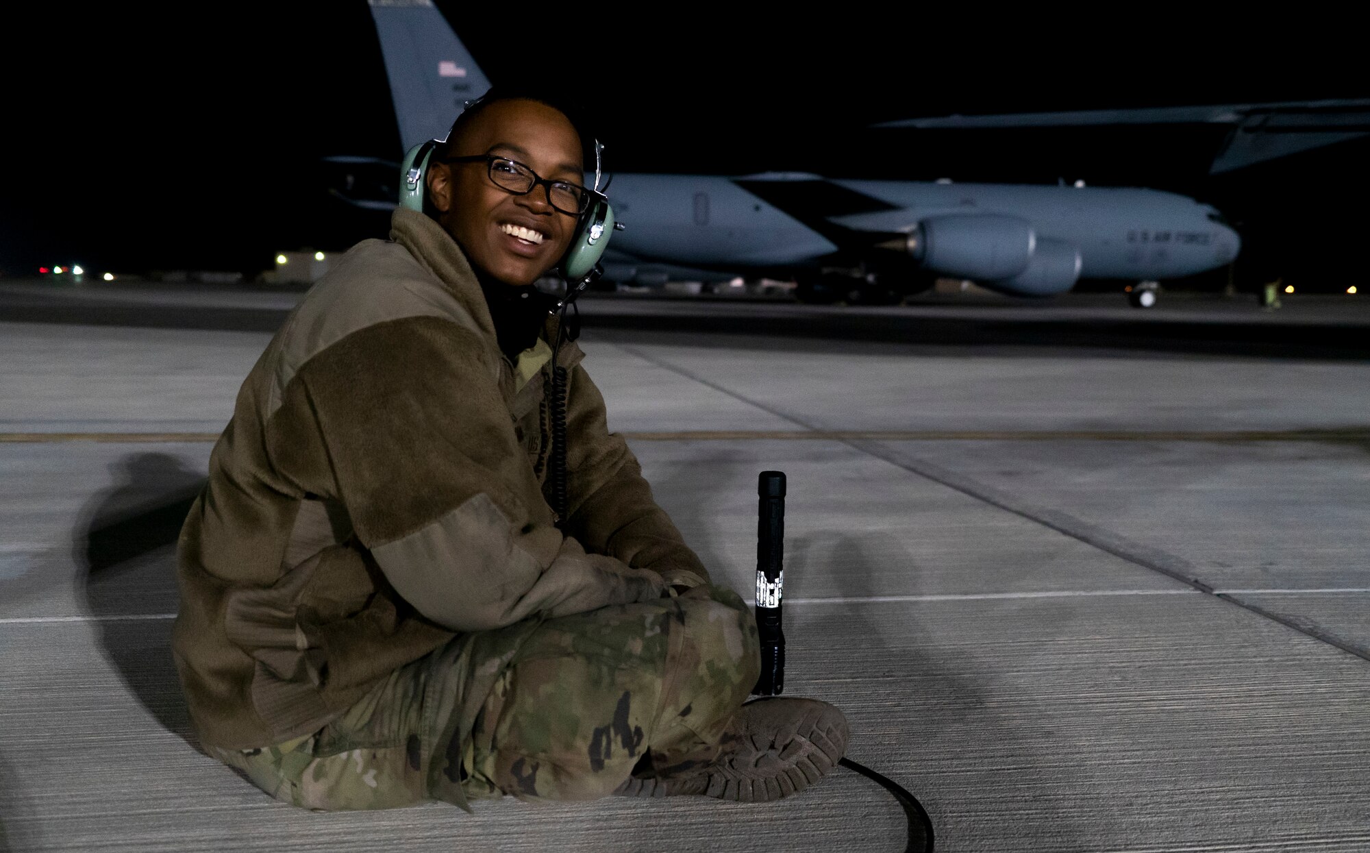 A U.S. Air Force KC-135 Stratotanker crew prepares to perform routine pre-flight checks at Al Udeid Air Base, Qatar, Feb. 16, 2021.