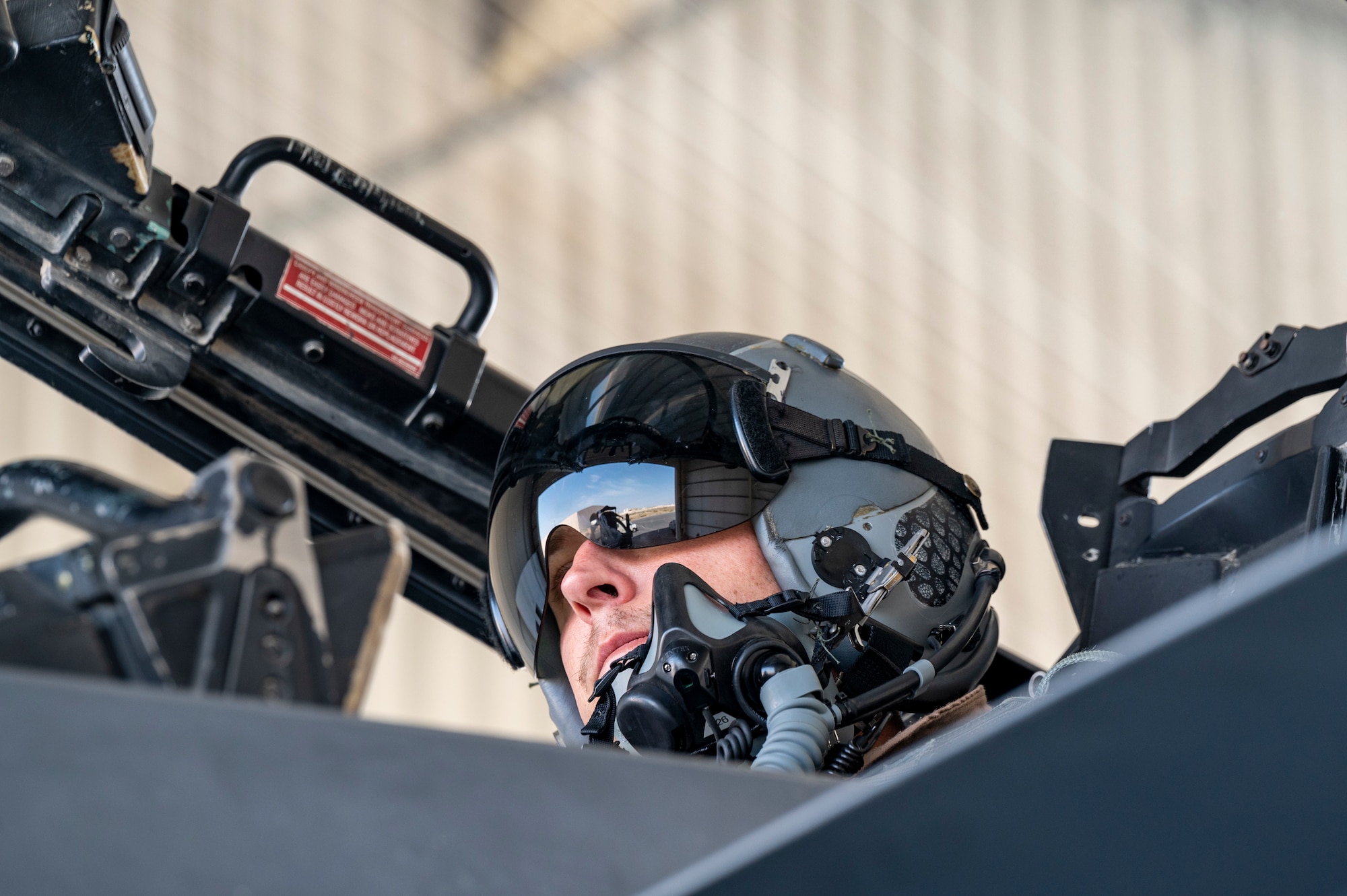 A weapons system officer (WSO) assigned to the 335th Expeditionary Fighter Squadron prepares to taxi out at Al Dhafra Air Base, United Arab Emirates, Feb. 18, 2021.