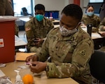 Connecticut Army National Guard medics practice vaccination skills at Fairfield Regional Fire Academy, Feb. 22, 2021, in Fairfield, Connecticut. The medics were activated as part of the Guard's COVID-19 response to support vaccination sites in Connecticut.