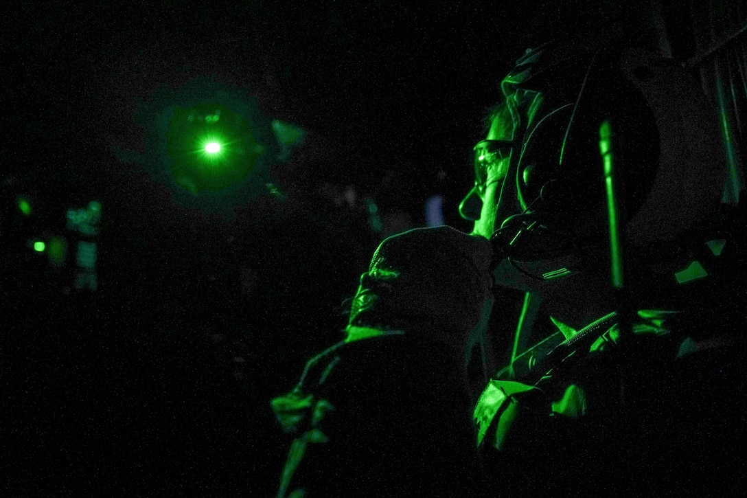 Marine Expeditionary Unit, rides in a CH-53E Super Stallion assigned to Marine Medium Tiltrotor Squadron (VMM) 165 (Reinforced), 11th MEU, for transport to a helicopter raid as part of Realistic Urban Training exercise at Marine Corps Air Station Yuma, Arizona, Feb. 22, 2021. RUT is the final shore-based predeployment training exercise for the 11th MEU, and provides an opportunity to plan and execute Marine Air-Ground Task Force operations in an urban environment. (U.S. Marine Corps photo by Sgt. Jennessa Davey)