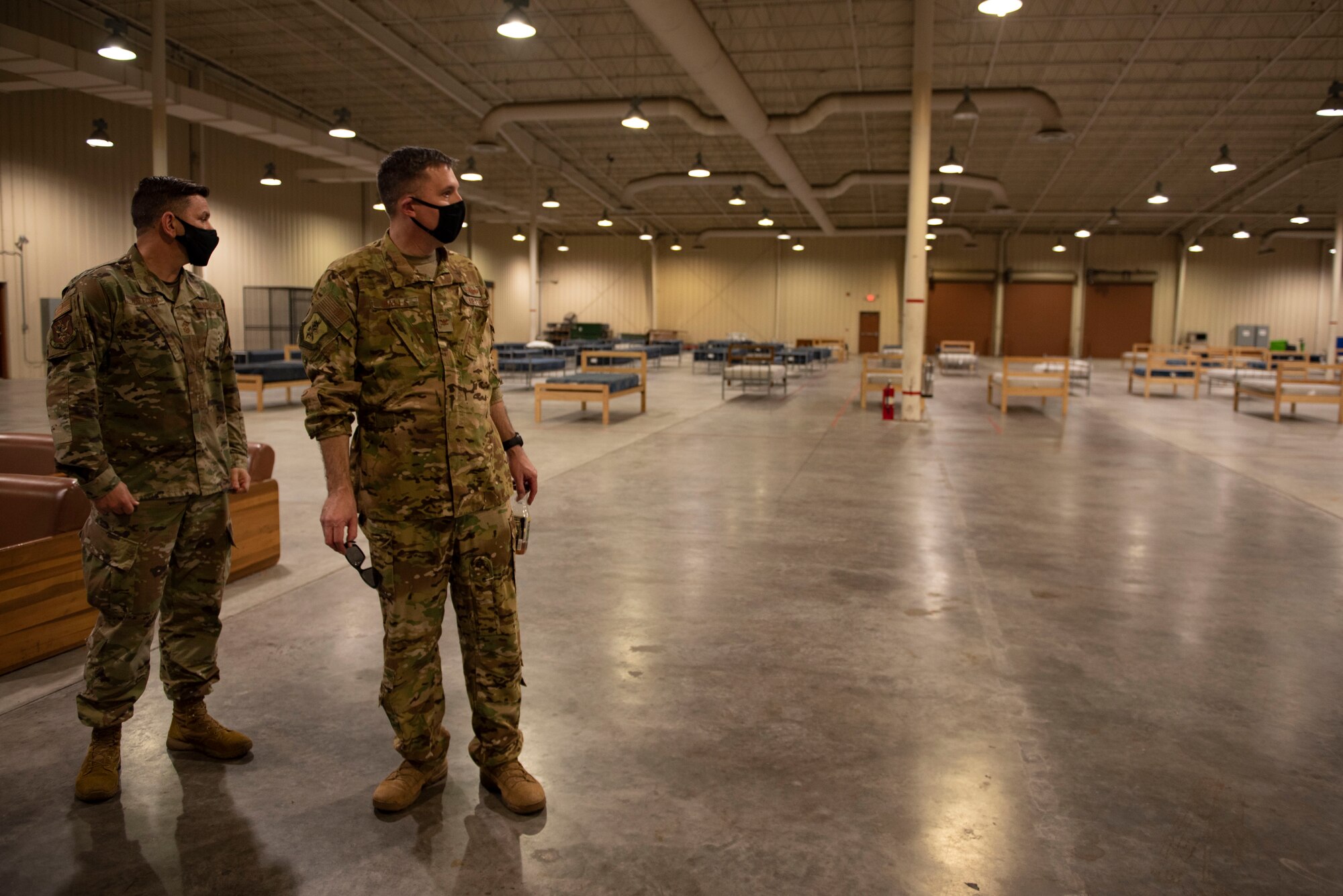 A photo of leadership touring sleeping quarters.