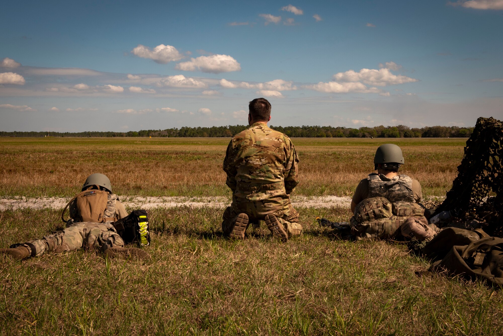 A photo of the 23d Wing commander talking to Airmen.