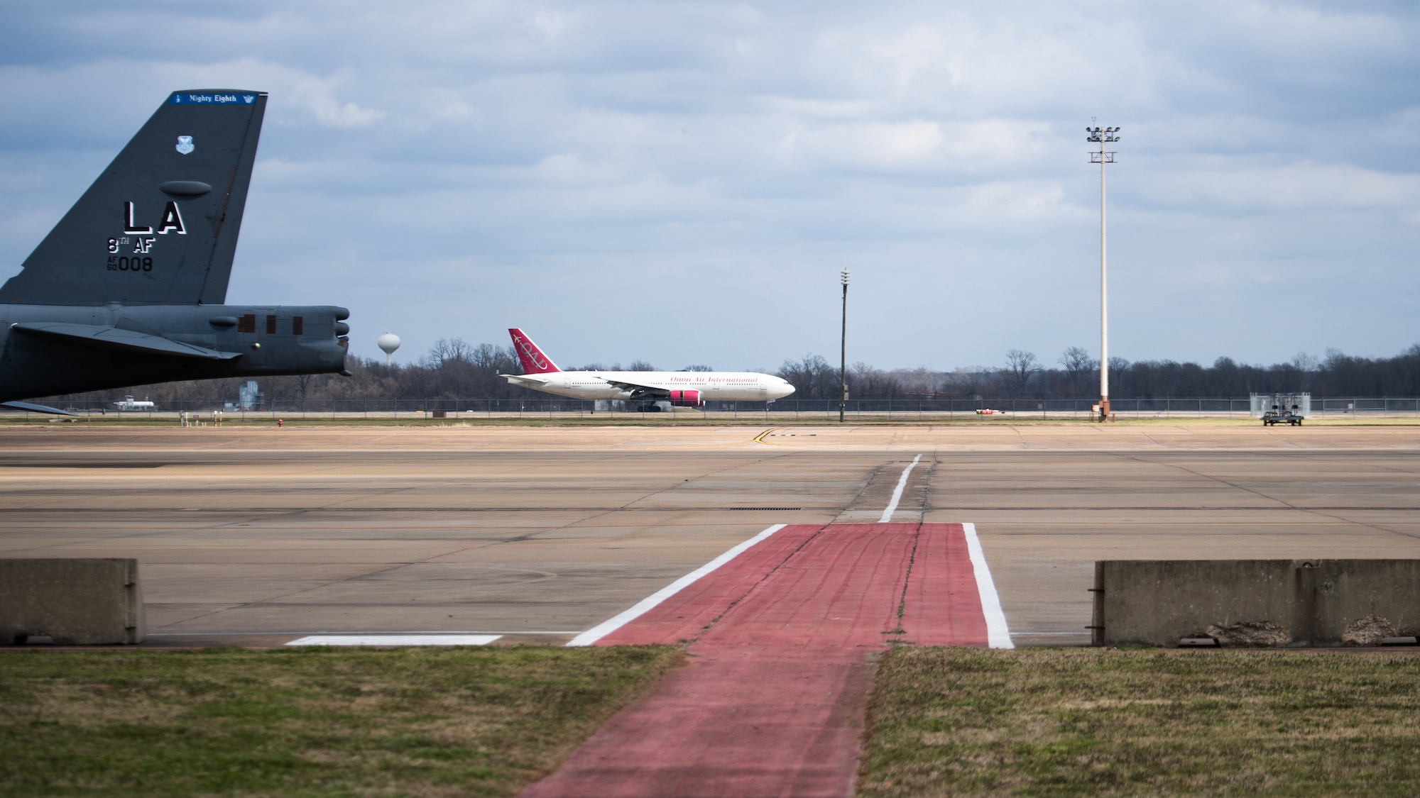 A plane carrying Airmen from the 2nd Bomb Wing returns to Barksdale Air Force Base, La., Feb. 24, 2021, after a Bomber Task Force deployment to Andersen Air Force Base, Guam. The BTF brought B-52H Stratofortress bombers and 2nd BW Airmen to the Indo-Pacific theater to test their ability to integrate and operate from a forward location. (U.S. Air Force photo by Airman 1st Class Jacob B. Wrightsman)