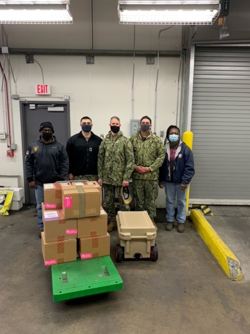 DLA Distribution Norfolk delivers COVID-19 vaccines to USS Eisenhower during winter storm