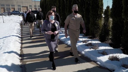 Strategic Command’s senior leader Adm. Charles Richard walks outside with Strategic Missions Chief Strategist Monica Hutchins.