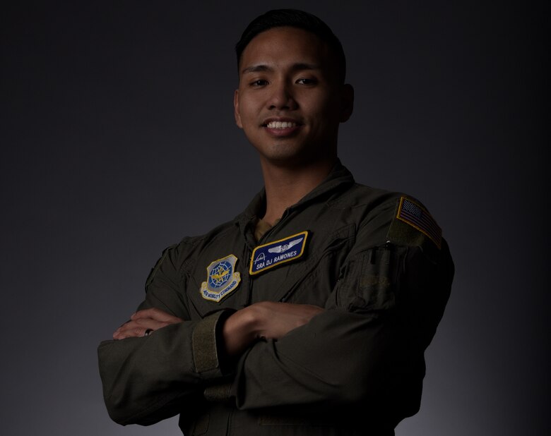 Airman Crosses his arms and smiles