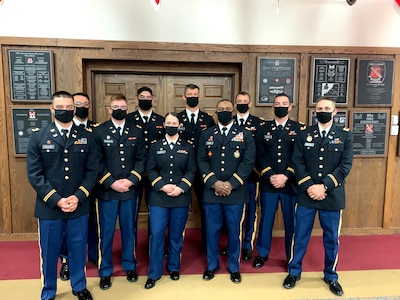 2nd Lt. Bennie Brown (fourth from right) stands with fellow engineer officer school graduates. Brown is the oldest African American officer and one of the oldest officers ever to graduate the engineer officer course at Fort Leonard Wood, Missouri. (photo illustration provided by 2nd Lt. Bennie Brown)