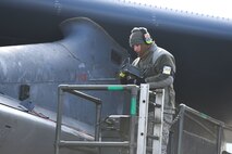 Airman 1st Class Frankie Sanchez, 5th Aircraft Maintenance Squadron weapons load crew member unloads munitions at Minot Air Force Base, North Dakota, Oct. 19, 2020. Prairie Vigilance is an annual exercise performed in conjunction with Barksdale AFB that demonstrates Air Force Global Strike Command's ability to generate strategic bombers at a moment's notice and provides readiness training annually for Airmen. (U.S. Air Force photos by Senior Airman Dillon J. Audit)