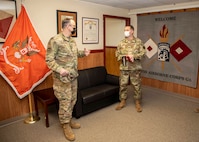 Air Force Lt. Col. Robert Harlan, the Joint Task Force Civil Support (JTF-CS) J6 communications director, left, meets with Army Lt. Col. Neal Green, the XVIII Airborne Corps G6 communications deputy director, to discuss defense chemical, biological, radiological, nuclear response force operational communication requirements as well as future collaboration, Feb. 25, 2021.
