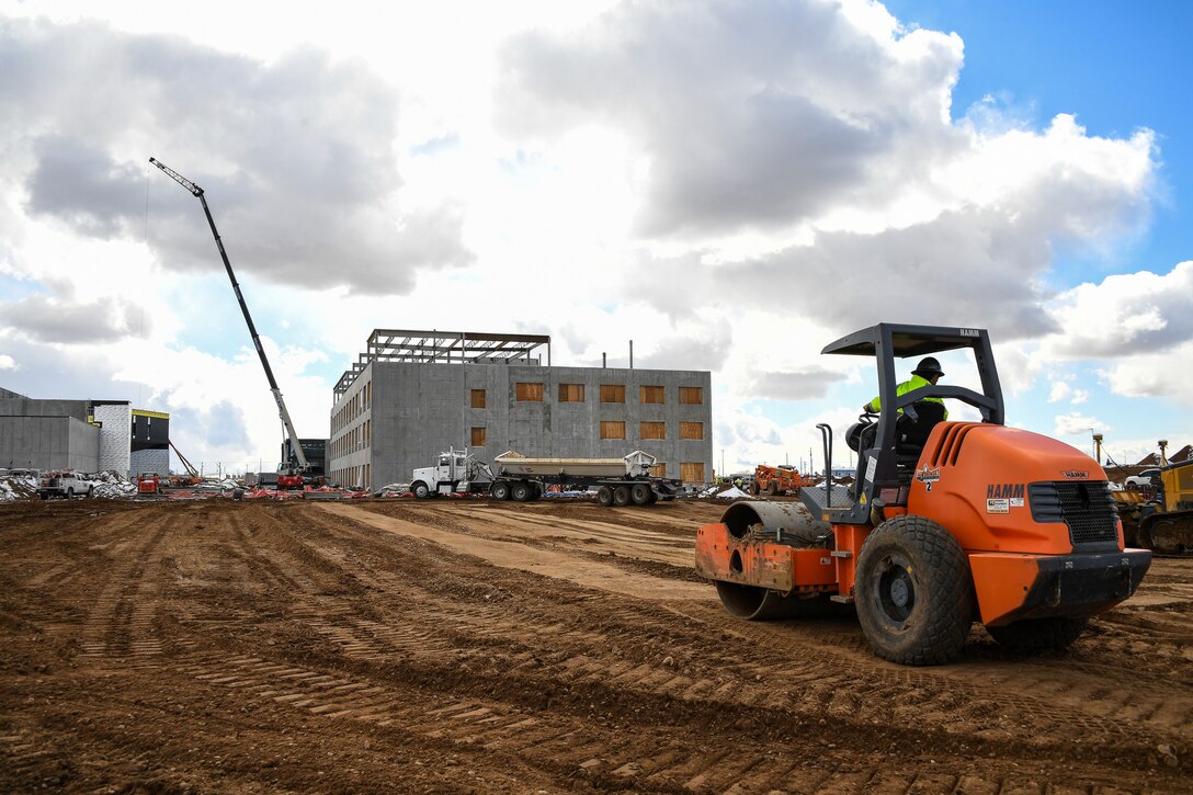 Construction crews work on buildings in the Roy Innovation Center at Hill Air Force Base, Utah, Feb. 24, 2021. The area is the future site of Northrup Grumman's headquarters for supporting DoD's Ground Based Stategic Deterrent program. Several other buildings are in planning as part an Enhanced Use Lease program. An EUL allows the Air Force to lease underutilized land to a private entity. (U.S. Air Force photo by R. Nial Bradshaw)