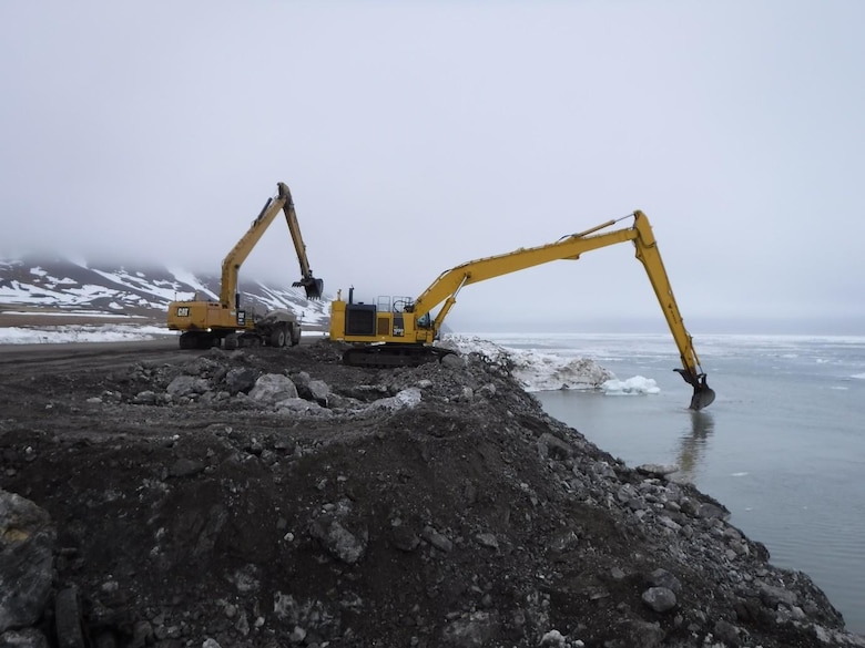 Crews work on the seawall as floating ice recedes at Cape Lisburne on May 23, 2020.