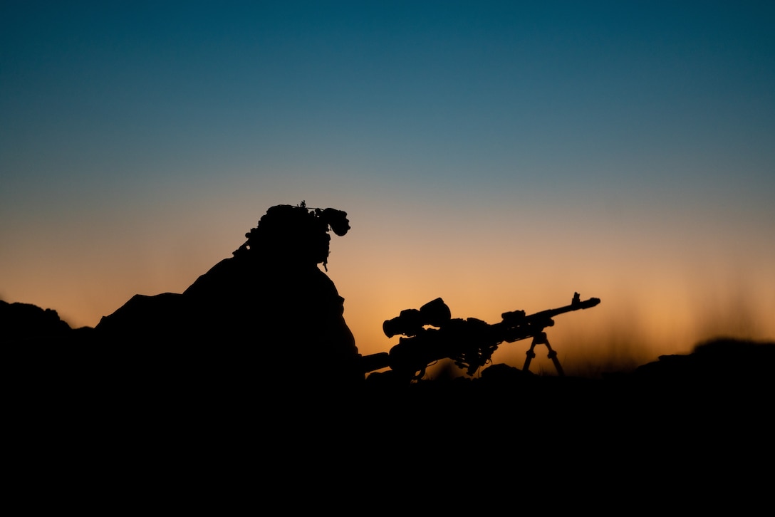 A Marine with 2nd Battalion, 3rd Marines, holds security with an M240B Medium Machine Gun while defending a checkpoint at the Marine Corps Air Ground Combat Center, Twentynine Palms, on February 17, 2021. Marines used Marine Warfighting Exercise to strengthen their skills and tactics for fighting a near peer adversary. (U.S. Marine Corps photo by Lance Cpl. Andrew R. Bray)