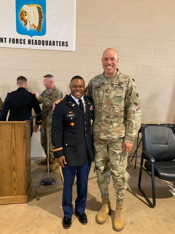 2nd Lt. Bennie Brown poses with Maj. Gen. Michael Thompson, adjutant general for Oklahoma, at Brown's commissioning ceremony, April 3, 2019. Brown is the oldest African American officer and one of the oldest officers ever to graduate the engineer officer course at Fort Leonard Wood, Missouri. (photo illustration provided by 2nd Lt. Bennie Brown)