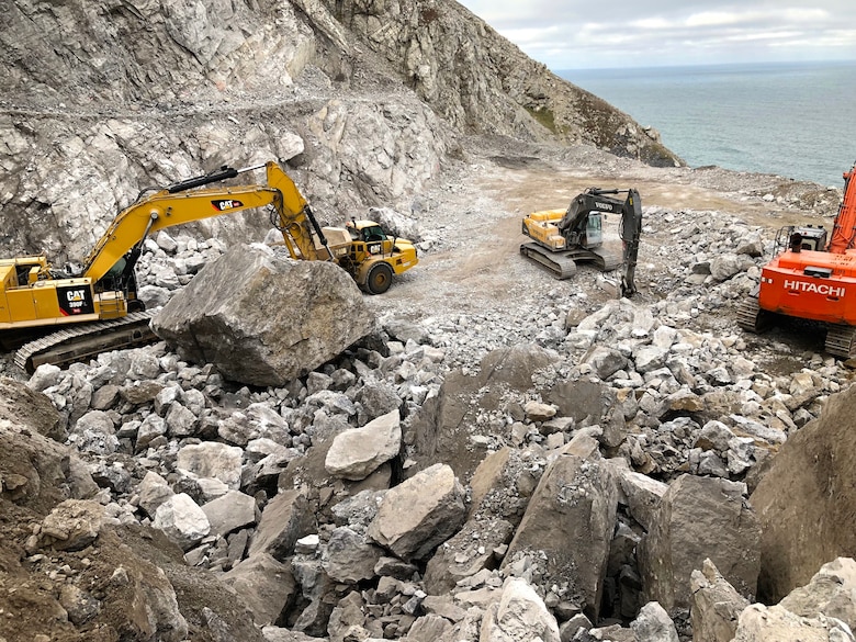 Workers excavate rocks from a quarry on property managed by the U.S. Fish and Wildlife Service near Cape Lisburne on Sep. 24, 2019.