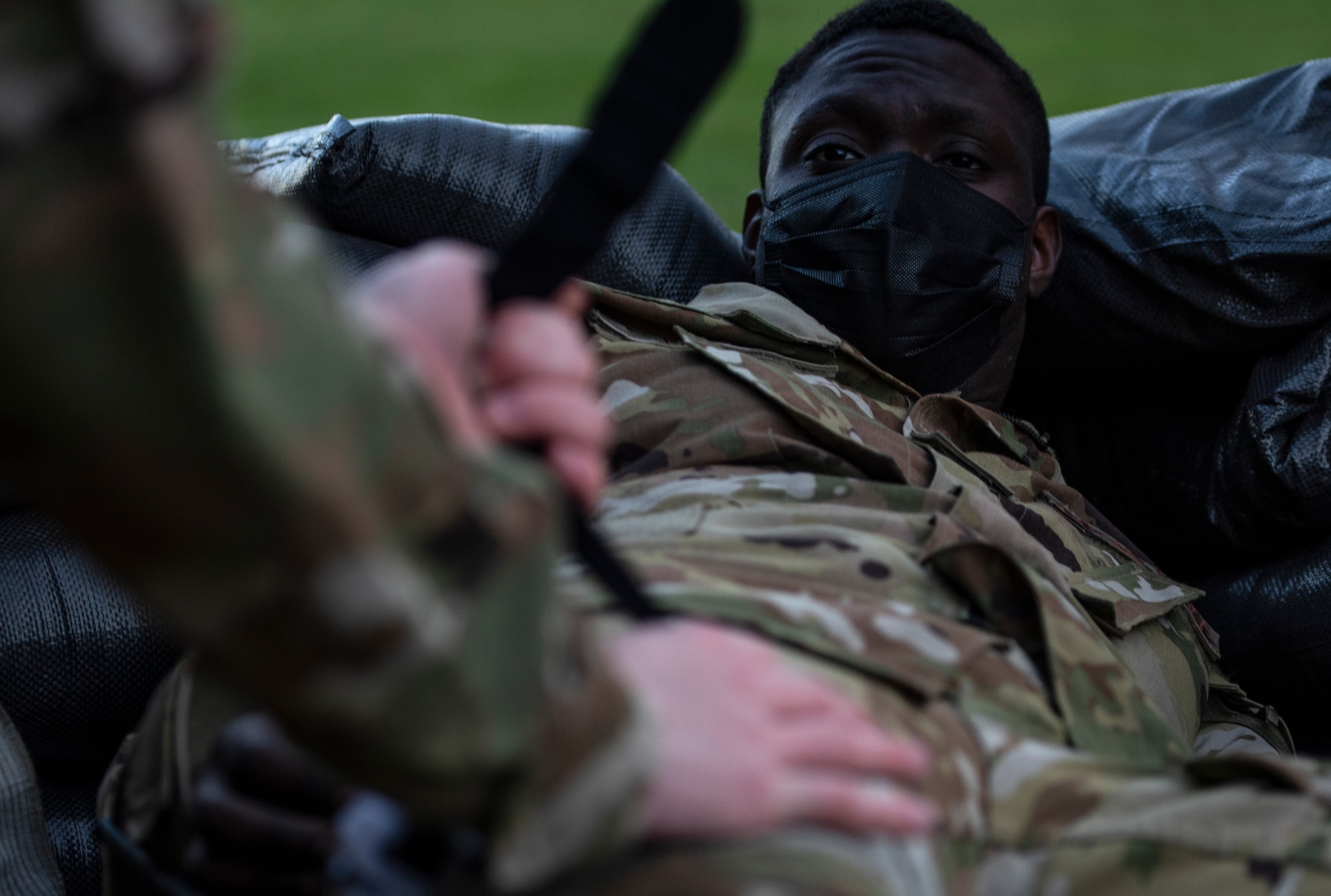 U.S. Air Force Airmen assigned to the 48th Civil Engineering Squadron perform post-attack reconnaissance sweeps during a readiness training at Royal Air Force Feltwell, Nov. 4, 2020. CES Airmen must maintain the ability to operate in all contingency environments through teamwork and practical application. (U.S. Air Force photo by Airman 1st Class Jessi Monte)