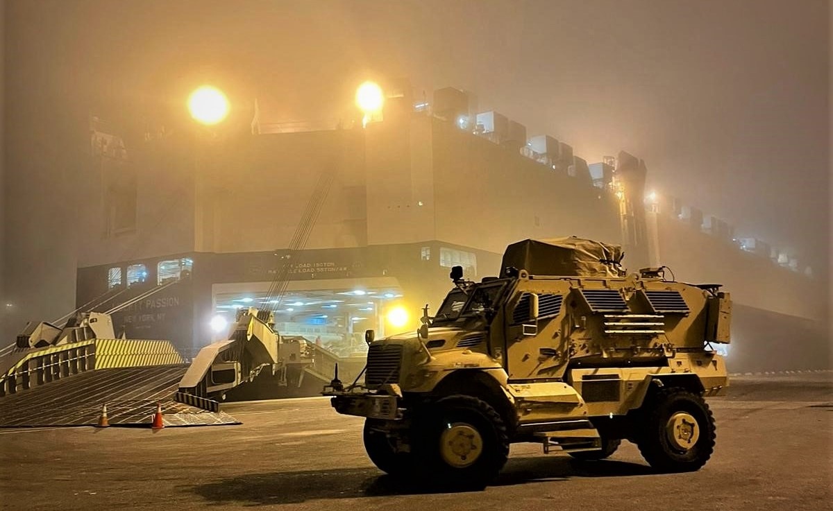 The 839thTransportation Battalion loads a Mine Resistant Ambush Protected Vehicle onto cargo vessel Liberty Passion in support of an Army Preposition Stock move from the APS-2 site at Leghorn Army Depot, Italy, to a new APS site location. The mission was the responsibility of the 405th Army Field Support Brigade’s Army Field Support Battalion-Africa with the 839th Trans. Bn. and multiple other units and organizations in support. (U.S. Army photo by Edward Salas)