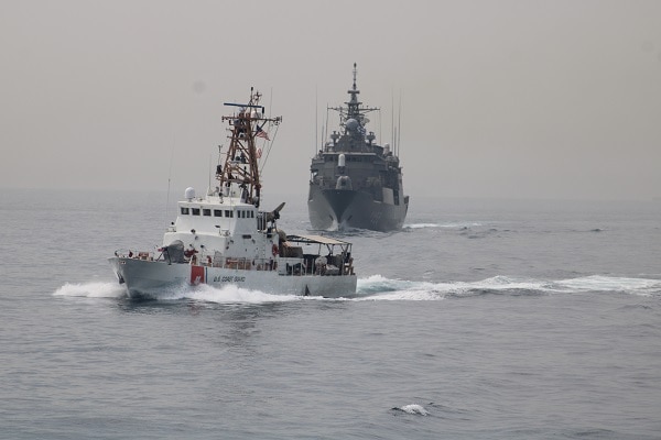 USCGC Maui (WPB 1304) and the Greek navy guided-missile frigate HS Hydra (F452) participate in a passing exercise in the Arabian Gulf.
