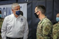 U.S. Army Lt. Col. Joe Adams, 90th Medical Operations Squadron commander, speaks with David Maurstad, acting FEMA Region II administrator, at the state-run, federally-supported Medgar Evers College COVID Community Vaccination Center in Brooklyn, N.Y., Feb. 22, 2021.
