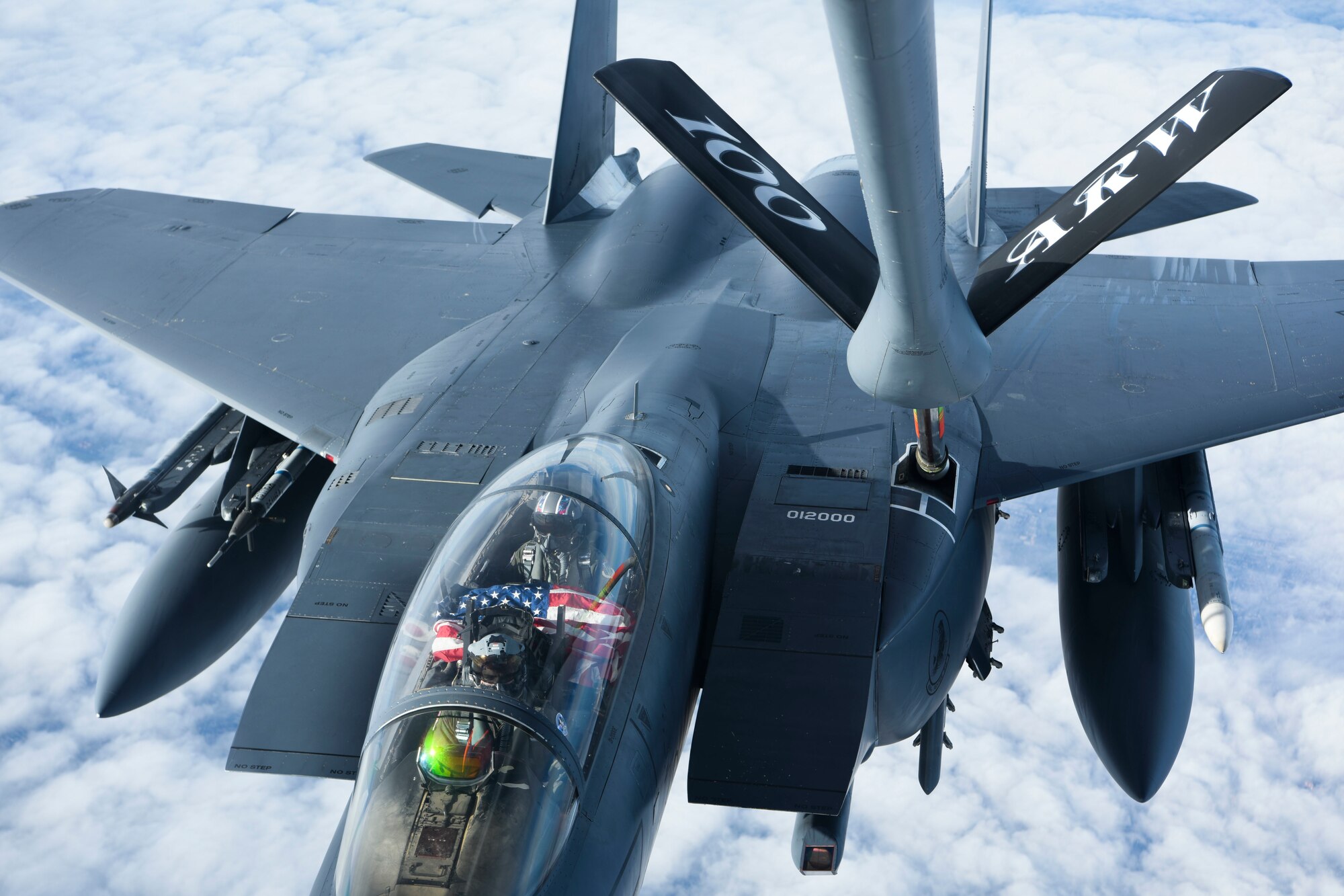 A U.S. Air Force F-15E Strike Eagle aircraft assigned to the 48th Fighter Wing, Royal Air Force Lakenheath, England, receives fuel from a KC-135 Stratotanker aircraft assigned to the 100th Air Refueling Wing from RAF Mildenhall, England, Feb. 24, 2021. The F-15E Strike Eagle is a dual-role fighter designed to perform air-to-air and air-to-ground missions. (U.S. Air Force Photo by Airman 1st Class David C Busby)