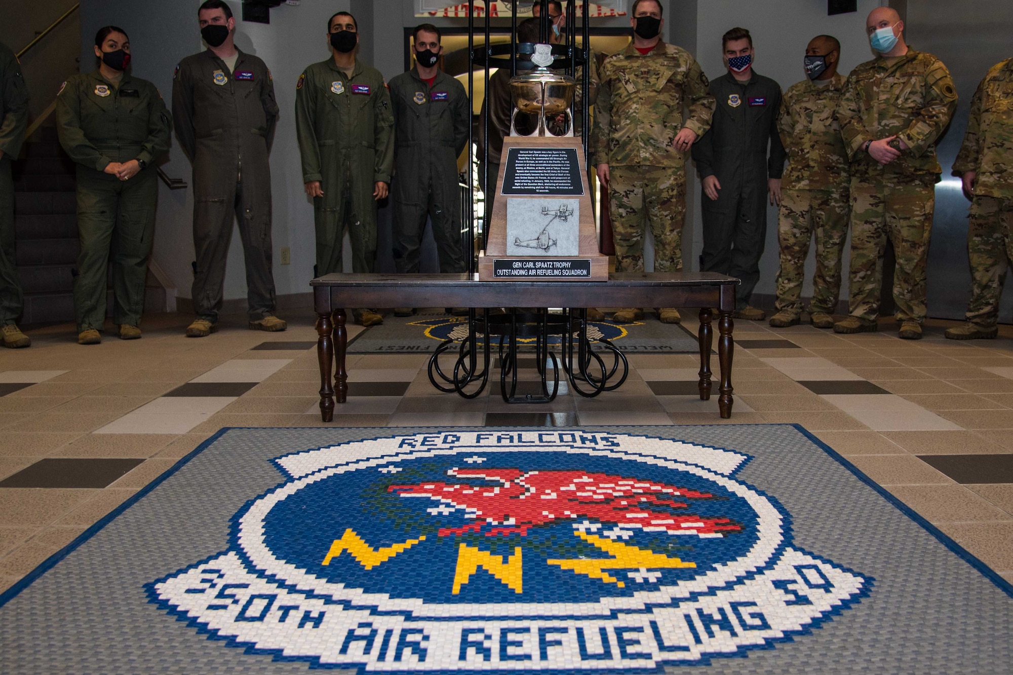 The 350th Air Refueling Squadron gathers before being awarded the Gen. Carl A. Spaatz Trophy during a ceremony at McConnell Air Force Base, Kansas, Feb. 5, 2021. This accomplishment designates the 350th ARS as the best air refueling squadron in the Air Force. (U.S. Air Force photo by Senior Airman Alexi Bosarge)