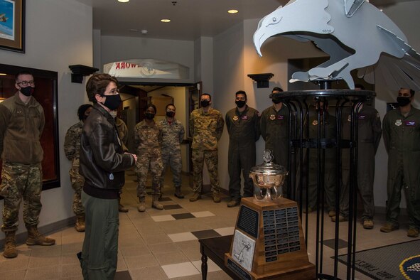Gen. Jacqueline Van Ovost, Air Mobility Command commander, congratulates the 350th Air Refueling Squadron for  being awarded the Gen. Carl A. Spaatz Trophy at McConnell Air Force Base, Kansas, Feb. 5, 2021. The trophy represents the 350th ARS’s dedication to seven areas: the mission, aircrew upgrading and training, safety record, aircrew enhancement and retention, outstanding individual and crew accomplishments, military and civilian education, and base and community relations. (U.S. Air Force photo by Senior Airman Alexi Bosarge)