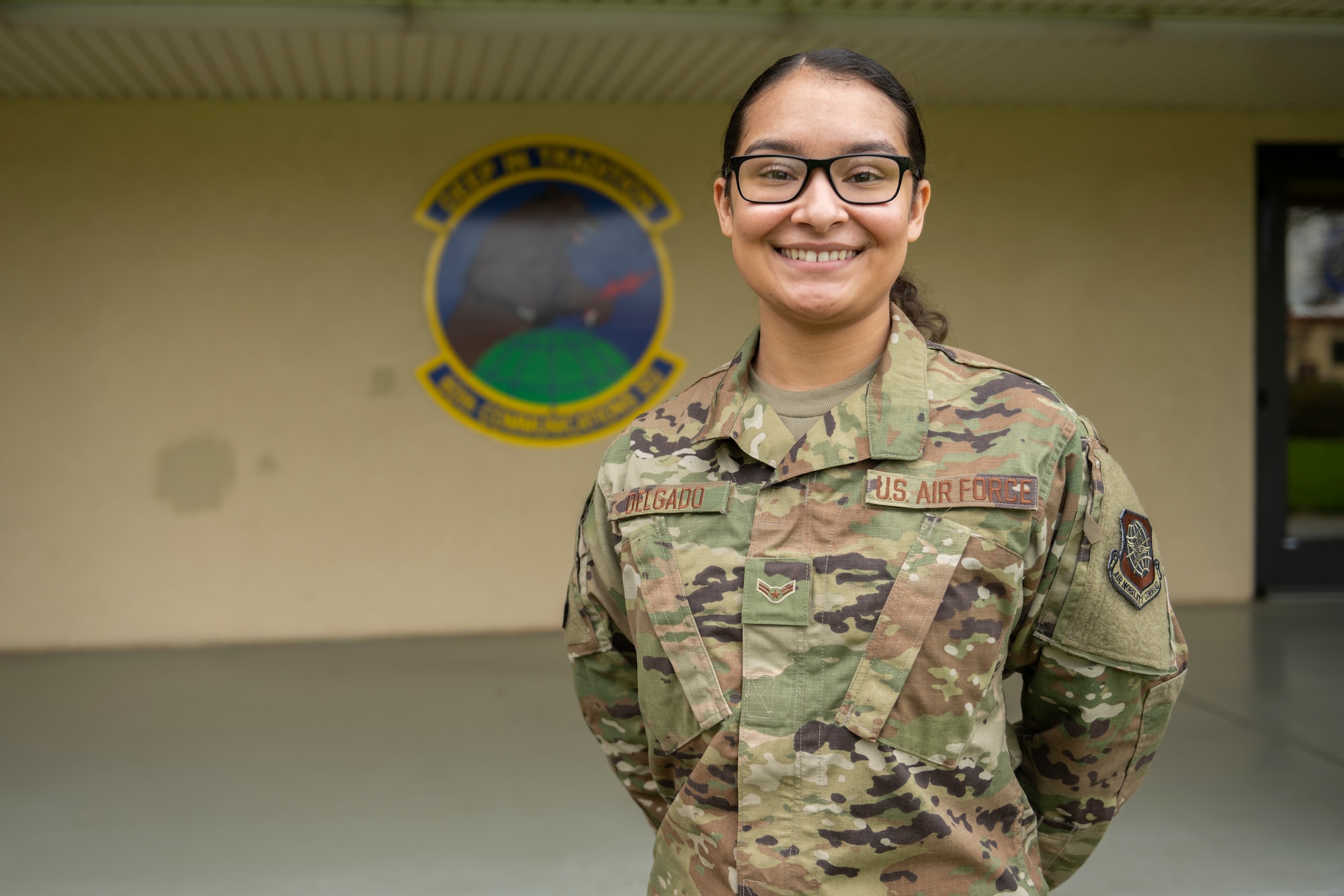 U.S. Airman 1st Class Thaila Delgado, 60th Communications Squadron knowledge management craftsman, poses for a photo Feb. 18, 2020, at Travis Air Force Base, California. Delgado drafted and coordinated with multiple base agencies to create a site that helps Airmen line up their budgeting, in efforts to help them move out of the base dorms more easily. (U.S. Air Force photo by Senior Airman Cameron Otte)