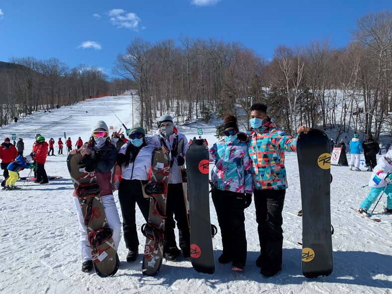 Airman Cortney Lee, from left, 66th Air Base Group command post controller, Tech. Sgt. DeShierra Tweggs, 66th Medical Squadron supervising dental technician, Staff Sgt. Donnovan Rios, 66 MDS noncommissioned officer of dental logistics, and Airman 1st Class Ma Kaila Eckermann and Senior Airman Joshua Lightning, 66 MDS dental technicians, pose for a photo during a 66th Force Support Squadron ‘Recharge 4 Resiliency’ trip to Wachusett Mountain, Mass., Feb. 21. The R4R programs seek to foster unit cohesion and sense of community for single Airmen, families and units both on and off the base (Courtesy Photo)