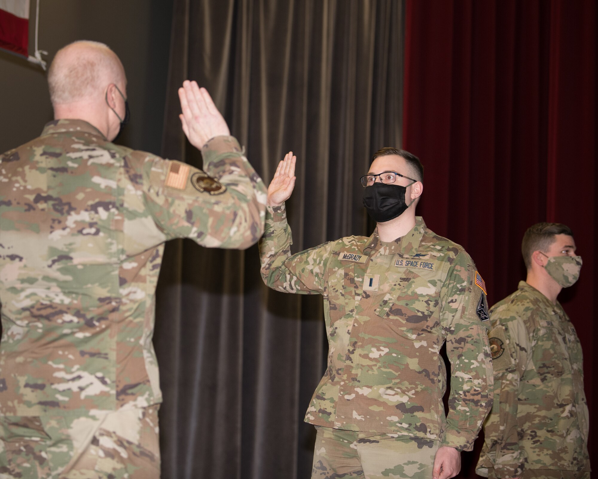 1st Lt. John McGrady, 436th Communications Squadron cyber operations flight commander, takes the oath of office commissions in the United States Space Force at Dover Air Force Base, Delaware, Feb. 12, 2021. McGrady became Dover’s very first Space Force Guardian. (U.S. Air Force photo by Mauricio Campino)