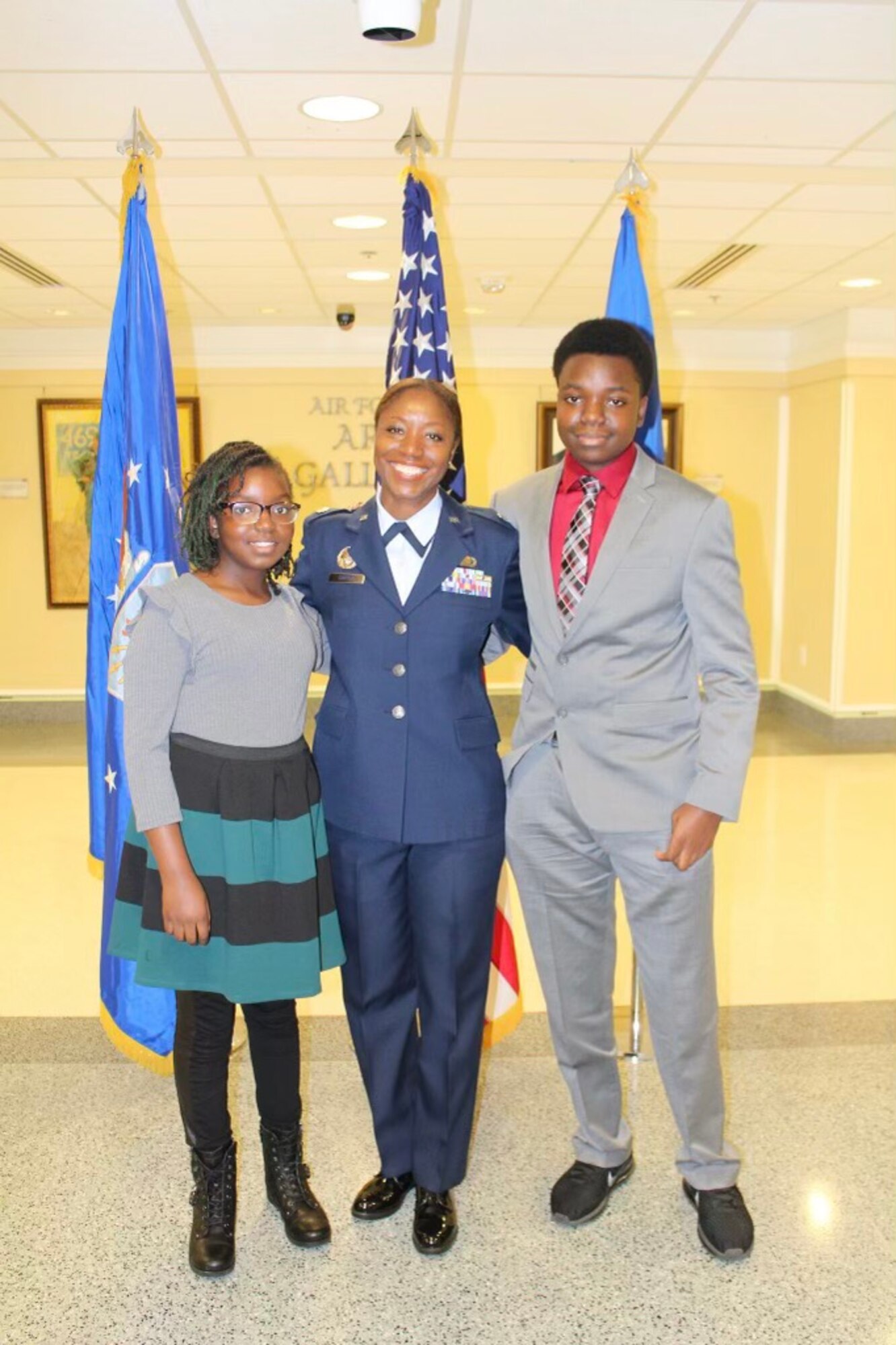 Lt. Col. Miriam Carter, 459th Force Support Squadron commander, poses for a photo with her children Jeremiah and Allie during her promotion ceremony at the Pentagon, September 2018. (Courtesy Photo)