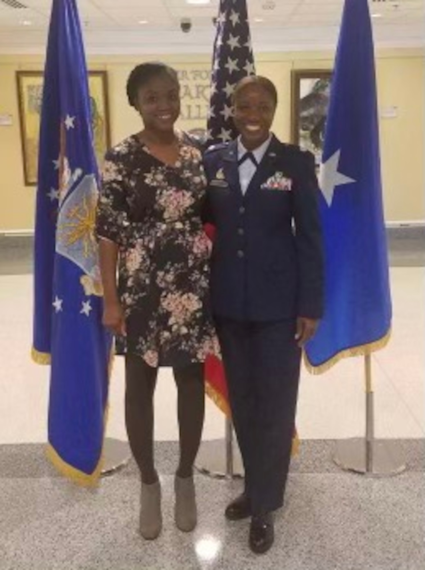 Lt. Col. Miriam Carter, 459th Force Support Squadron commander, poses for a photo with her sister Andrea Ayers during her promotion ceremony at the Pentagon, September 2018. (Courtesy Photo