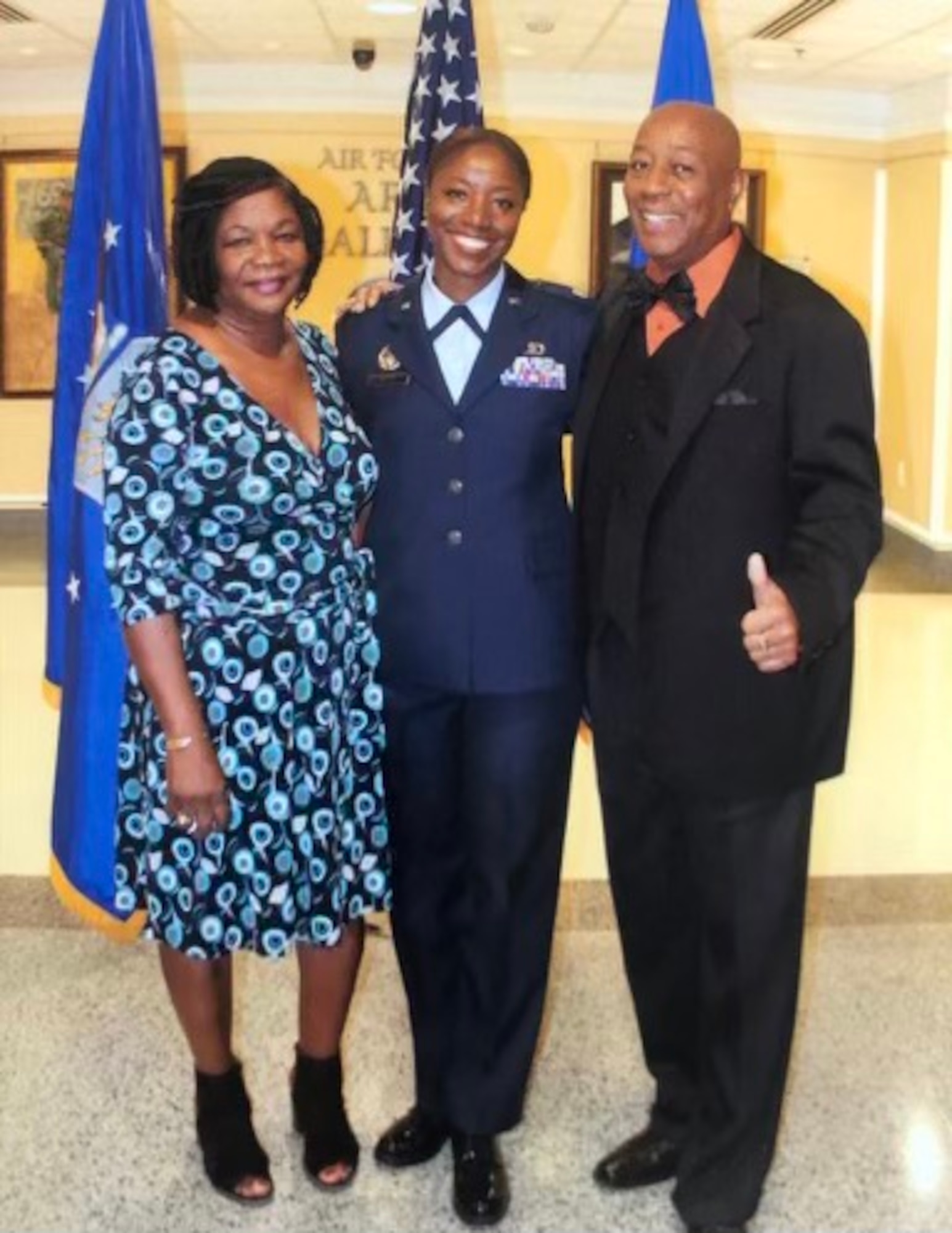Lt. Col. Miriam Carter, 459th Force Support Squadron commander, poses for a photo with her parents Lenore Ayers and Errol Rivers during her promotion ceremony at the Pentagon, September 2018. (Courtesy Photo)
