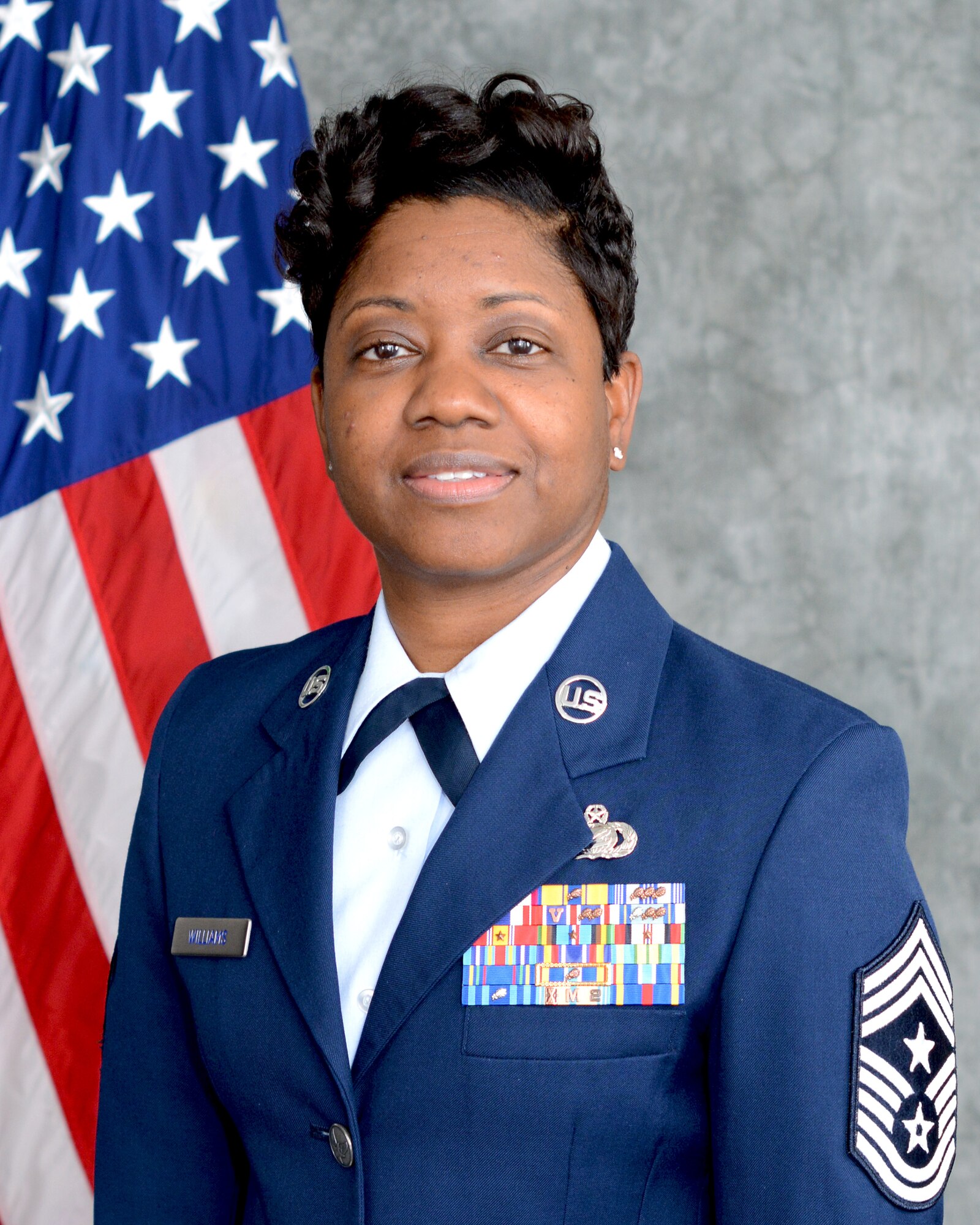 Chief Master Sgt. Takesha Williams, 931st Air Refueling Wing command chief, poses for a photo Jan. 24, 2019, at Tinker Air Force Base, Oklahoma. Williams is the first female African American Airman to serve as the command chief of the 931st ARW. (U.S. Air Force photo by Tech. Sgt. Samantha Mathison)
