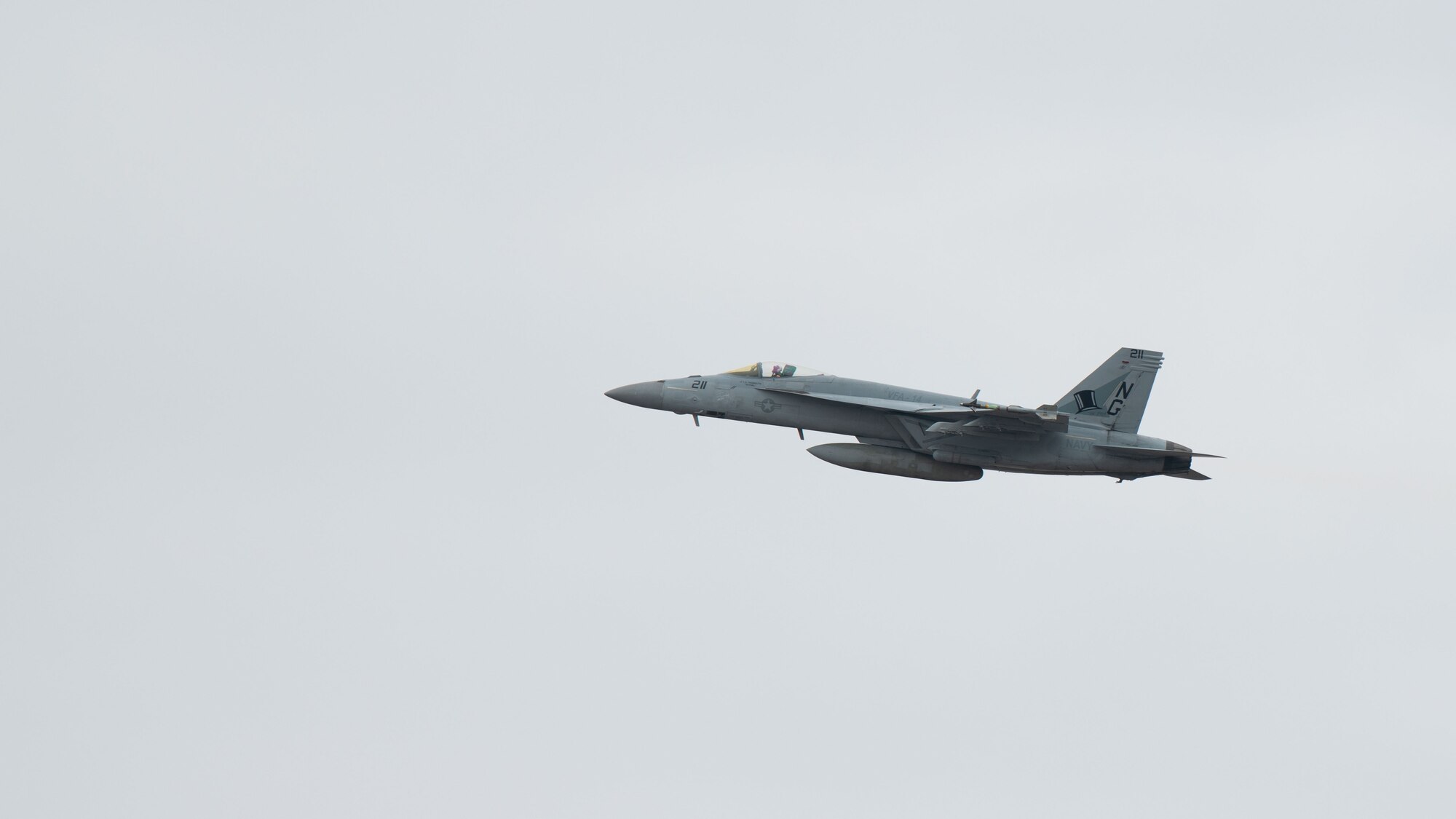 A U.S. Navy F/A-18 Super Hornet assigned to Strike Fighter Squadron 14 (VFA-14)from Naval Air Station Lemoore, California, takes off for a Weapons System Evaluation Program training flight at Tyndall Air Force Base, Florida, Feb. 19, 2021. WSEP’s joint operations and training help build and strengthen bonds throughout different units in the Department of Defense. (U.S. Air Force photo by Senior Airman Jacob Dastas)