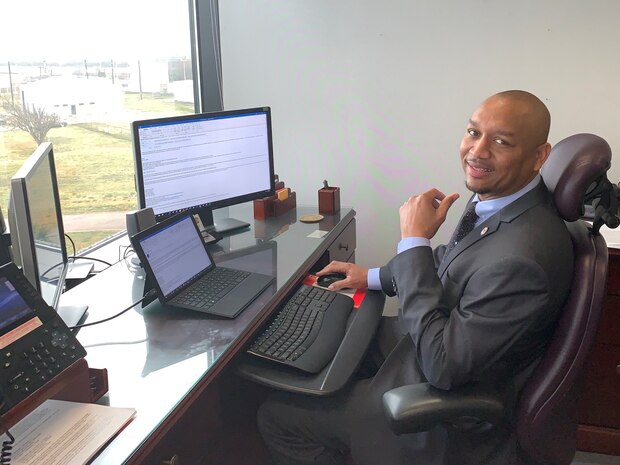 Byron Williams at his desk.