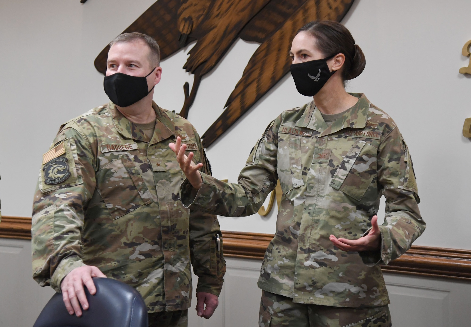 U.S. Air Force Col. Heather Blackwell, 81st Training Wing commander, speaks with Brig. Gen. Chad Raduege, Director of Cyberspace and Information Dominance and Chief Information Officer, Headquarters Air Combat Command, Joint Base Langley-Eustis, Virginia, at Keesler Air Force Base, Mississippi, Feb. 22, 2021. Raduege received an 81st Training Group immersion tour and attended the 39th Information Operations Squadron Detachment 2 activation ceremony. (U.S. Air Force photo by Kemberly Groue)