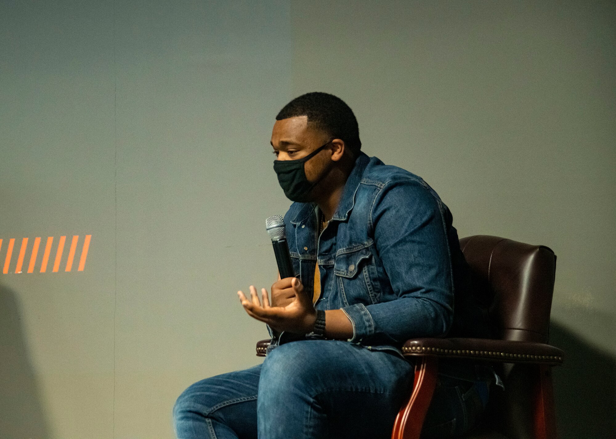 Photo of Airman talking at a panel