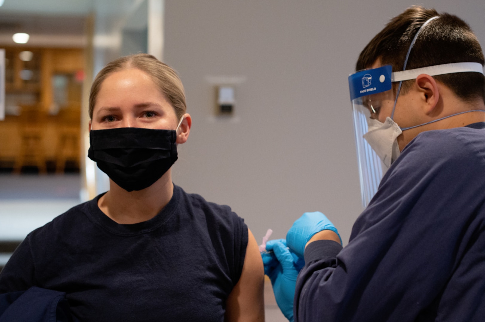Coast Guard service members receive their initial dose of the Pfizer-BioNTech COVID-19 vaccine at U.S. Coast Guard Training Center Cape May, N.J., Jan. 8, 2021.