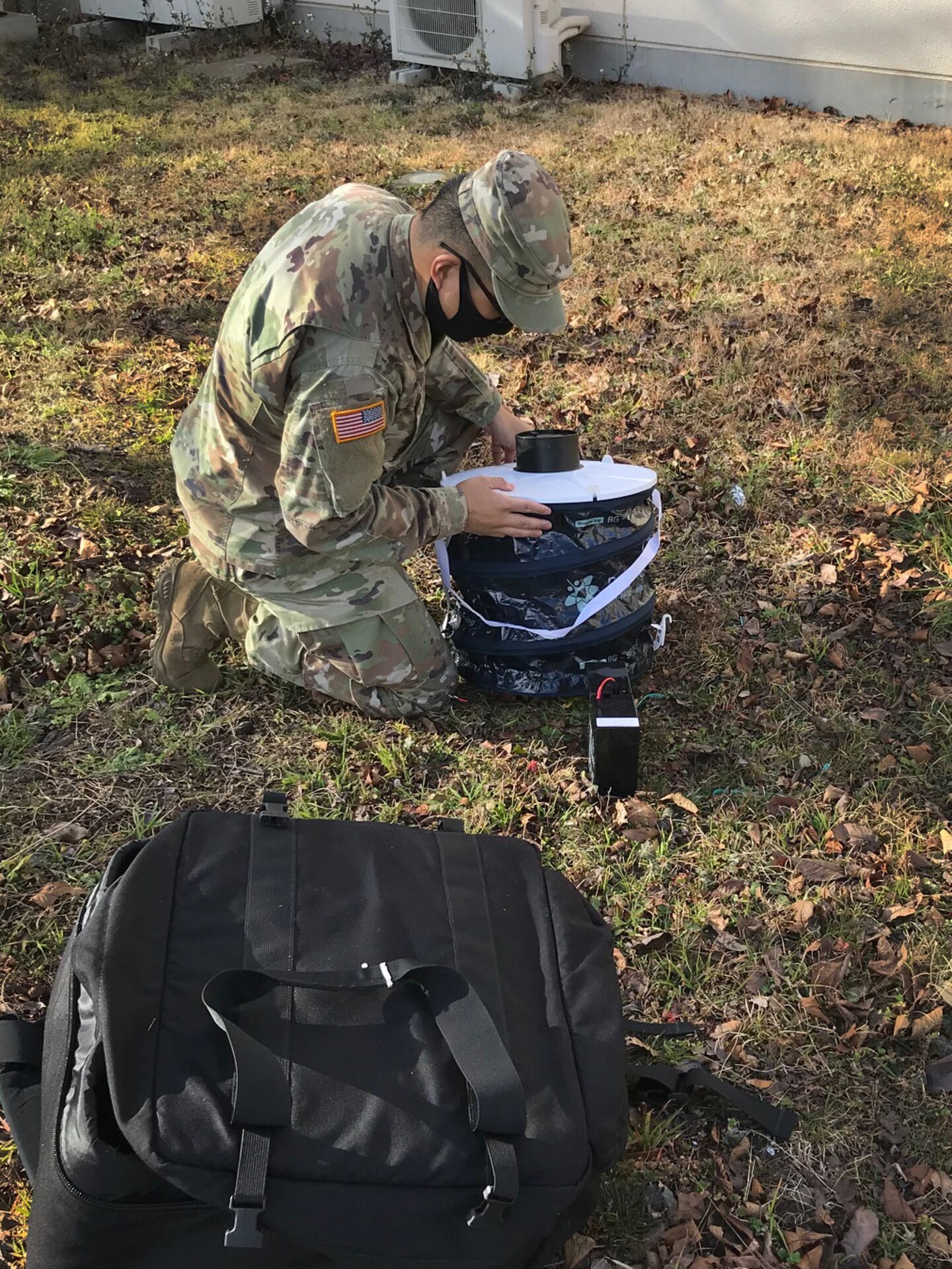 Staff Sgt. Matthew Pascual, noncommissioned officer in charge of entomology for Public Health Command-Pacific in Japan, assembles the BG-Sentinel 2 trap, specialized at collecting the day biting mosquitoes Aedes albopictus, Ae. aegypti, and Ae. polynesiensis on Camp Zama, Japan, Feb. 25, 2021. Collecting vector samples allows for PHC-P scientists to analyze areas of interest for potential vector-borne diseases that could impact the health of the force.