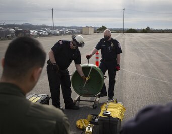 Aircraft Rescue and Firefighting Marines with Headquarters and Headquarters Squadron, Marine Corps Air Station Miramar, and firefighters with the MCAS Miramar Fire Department conduct hazardous materials training at MCAS Miramar, San Diego, California, Feb. 1, 2021. The training reinforced MCAS Miramar's readiness incase of a HAZMAT emergency. (U.S. Marine Corps photo by Lance Cpl. Krysten Houk)