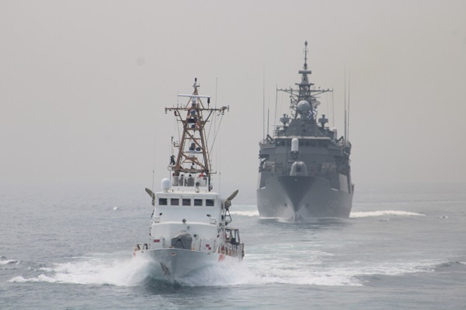 U.S. Coast Guard patrol boat USCGC Maui (WPB 1304) and Greek guided-missile frigate HS Hydra (F452) participate in a passing exercise in the Arabian Gulf, Feb. 25.  U.S. Coast Guard Patrol Forces Southwest Asia (PATFORSWA) is comprised of six 110' cutters, the Maritime Engagement Team, shore side support personnel, and is the Coast Guard's largest unit outside of the U.S. playing a key role in supporting Navy security cooperation, maritime security, and maritime infrastructure protection operations in the U.S. 5th Fleet area of operations.