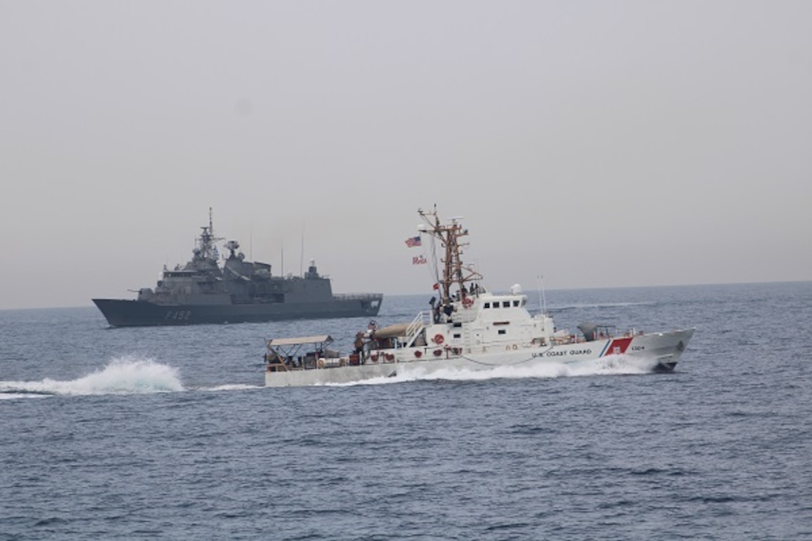 U.S. Coast Guard patrol boat USCGC Maui (WPB 1304) and Greek guided-missile frigate HS Hydra (F452) participate in a passing exercise in the Arabian Gulf, Feb. 25.  U.S. Coast Guard Patrol Forces Southwest Asia (PATFORSWA) is comprised of six 110' cutters, the Maritime Engagement Team, shore side support personnel, and is the Coast Guard's largest unit outside of the U.S. playing a key role in supporting Navy security cooperation, maritime security, and maritime infrastructure protection operations in the U.S. 5th Fleet area of operations.